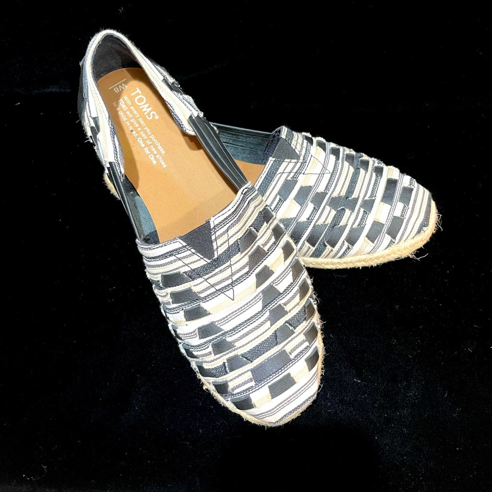 TOMS beige and black woven flats.